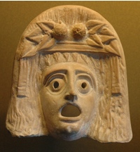 La maschera di Dioniso La maschera di Dioniso<br>dal Museo del Louvre<br><i>(c) degli aventi diritto</i>